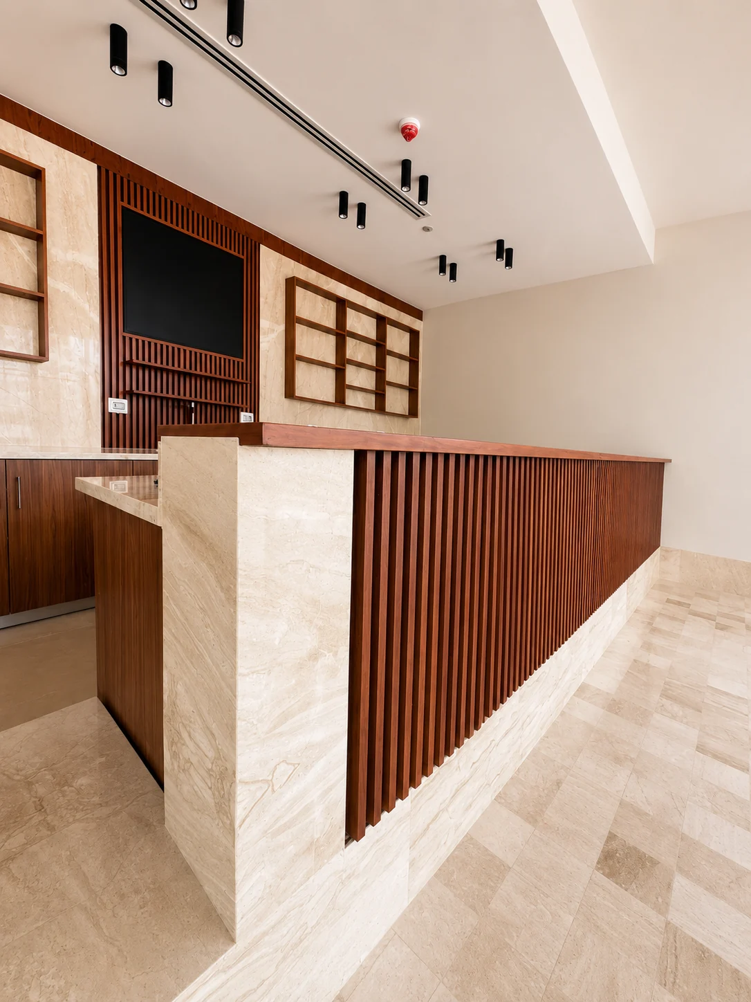 Reception counter in ribbed timber with stone top